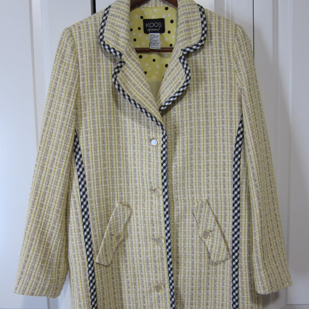 Knee length late spring - early fall jacket